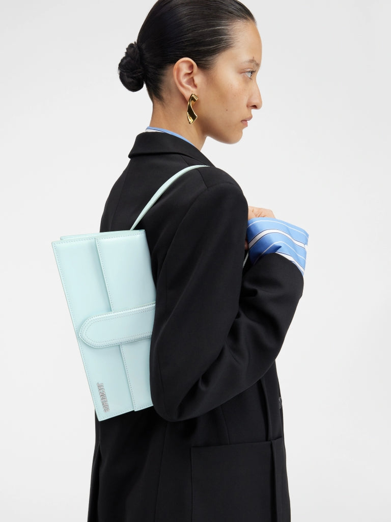 wearing JACQUEMUS LE GRAND BAMBINO LONG LIGHT BLUE 221BA013-3128-320