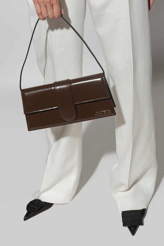 wearing JACQUEMUS LE GRAND BAMBINO LONG MIDNIGHT BROWN 221BA013-3128-890