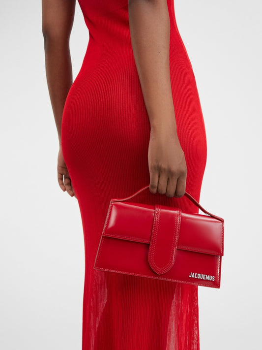 wearing JACQUEMUS LE GRAND BAMBINO RED 213BA007-3128-470