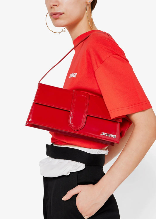 wearing JACQUEMUS LE LONG BAMBINO RED/SILVER 221BA013-3128-470