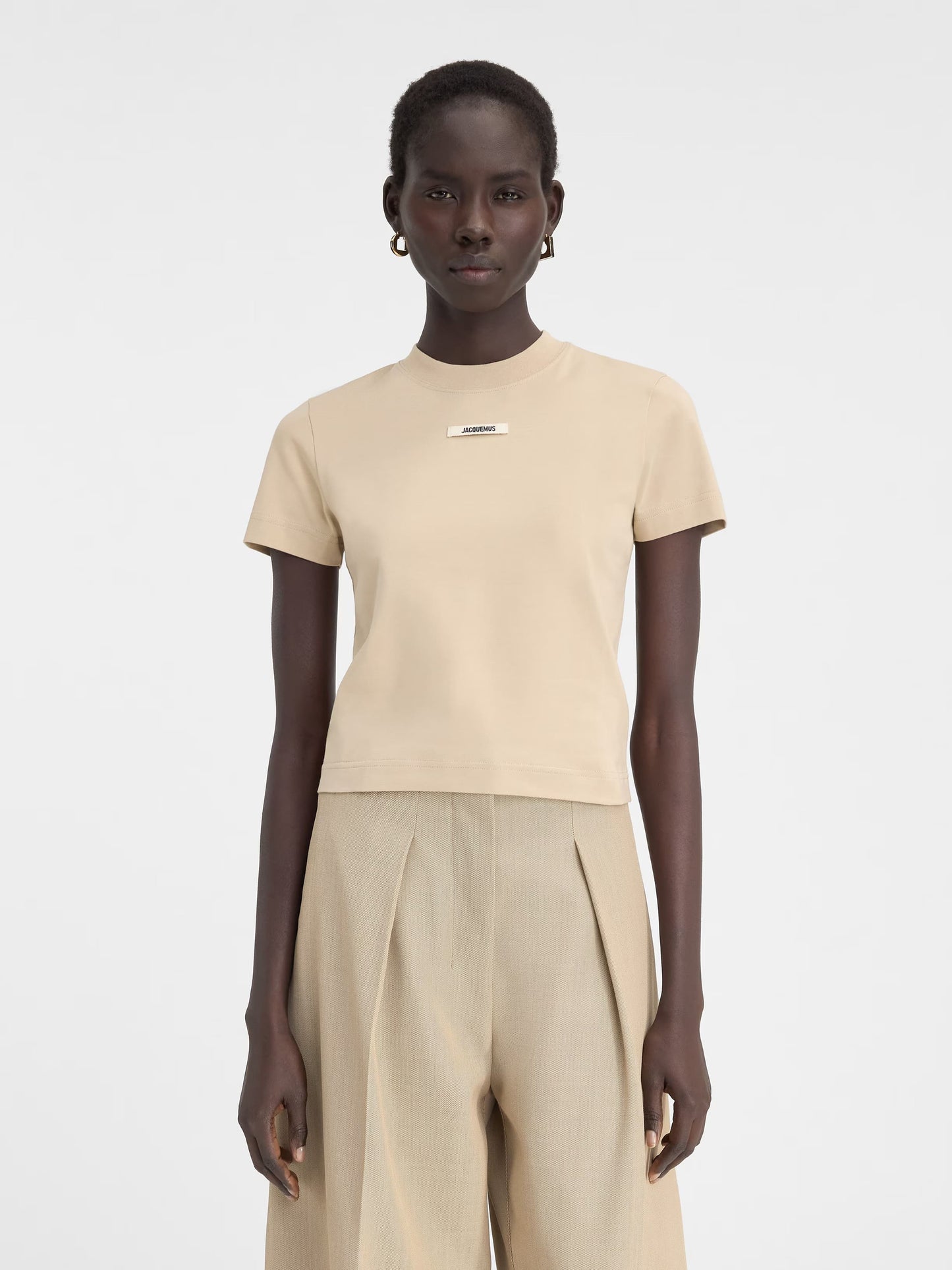 wearing Jacquemus The Grois Grain T-Shirt Beige 241JS133-2031-151