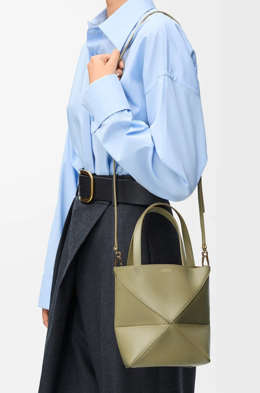 wearing Loewe Mini Puzzle Fold Tote in Shiny Calfskin – Eucalyptus Green a657v25x01-4787
