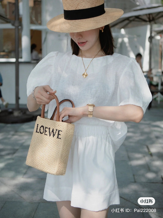 mẫu mang túi LOEWE STANDARD A5 TOTE BAG IN NATURAL/TAN RAFFIA A563S30X05