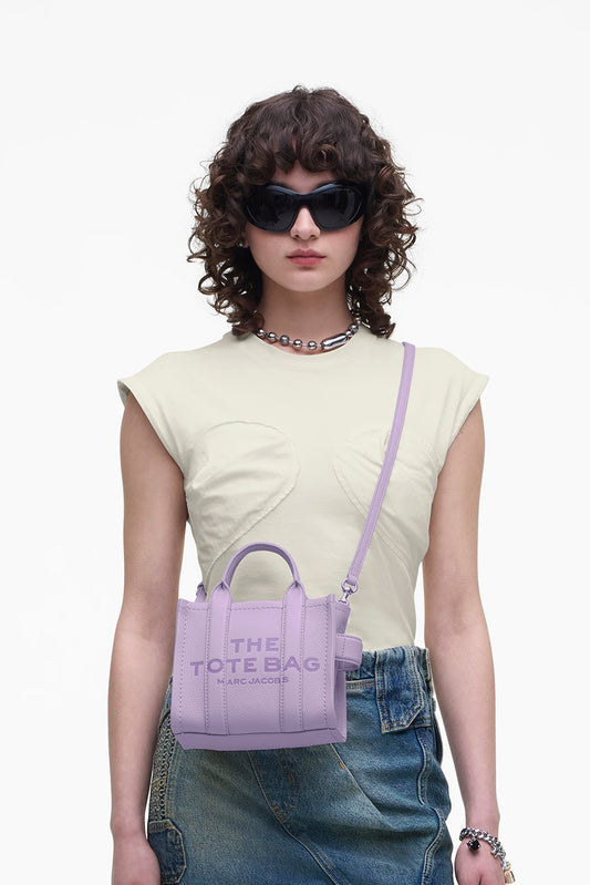 wearing Marc Jacobs The Leather Crossbody Tote Bag Lilac H053L01RE22_545