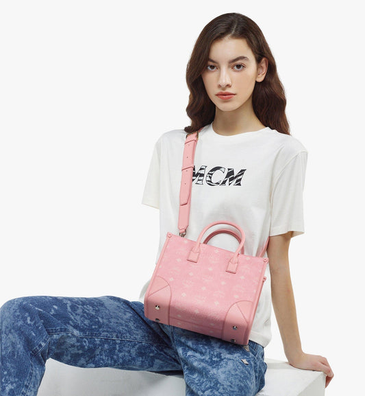 wearing MCM Small München Tote in Blossom Pink Visetos MWTCABO07QZ001