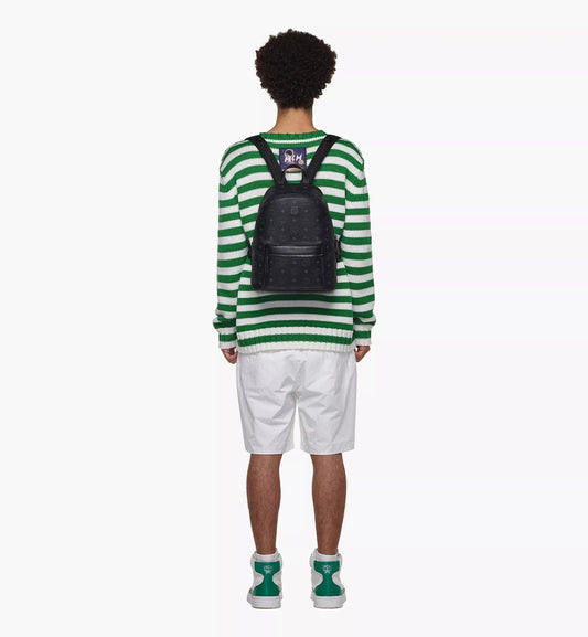 mẫu nam đeo balo MCM STARK SMALL BACKPACK IN BLACK VISETOS MMKCSVE02BK001