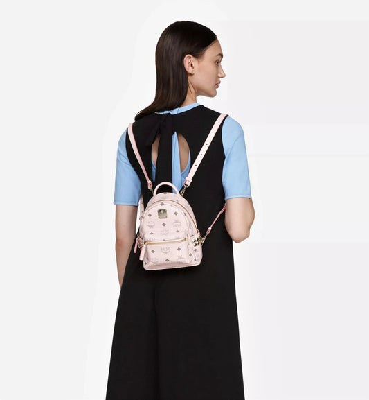 mẫu đeo balo MCM X-MINI STARK BEBE BOO SIDE STUDS BACKPACK IN POWDER PINK VISETOS MMK6SVE92QH001