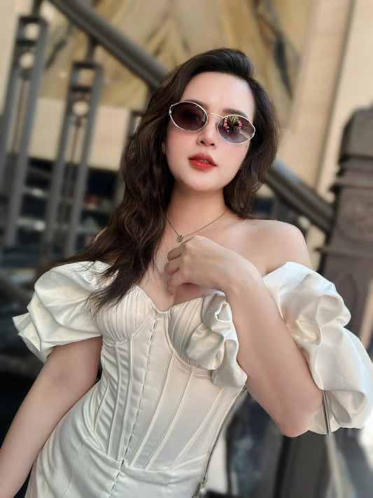 wearing MIU MIU 52YS ZVN5D1 LOGO SUNGLASSES GRADIENT SMOKY GRAY LENSES SMU52Y_EZVN_F05D1_C_054