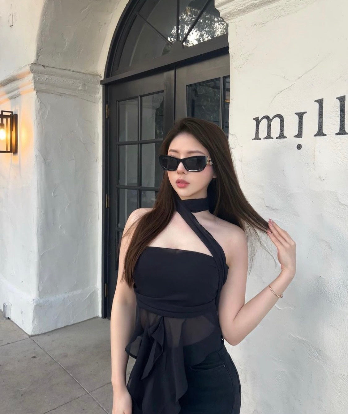 wearing MIU MIU GLIMPSE MU09WS 1AB5S0 SUNGLASSES IN BLACK SMU09W_E1AB_F05S0_C_053