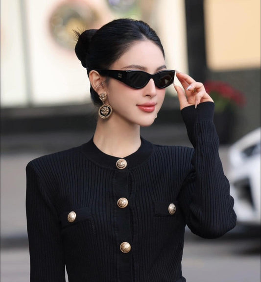 wearing MIU MIU MU03ZS 1AB5S0 CAT-EYE SUNGLASSES