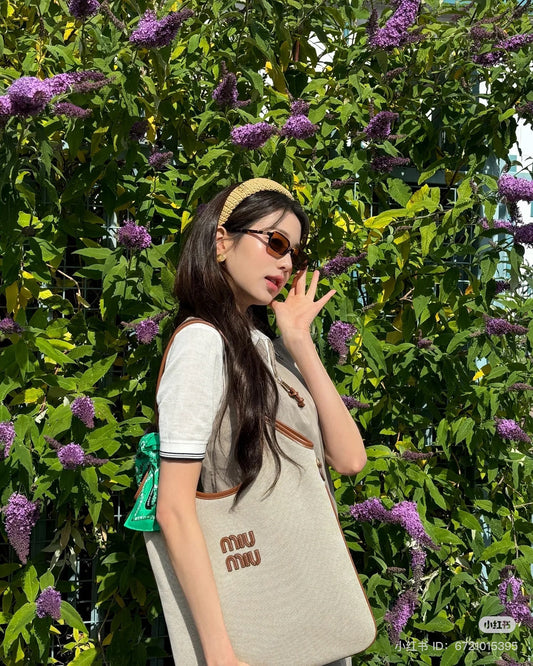 wearing MIU MIU MU 11ZS VAU2Z1 REGARD SUNGLASSES CAMEL BEIGE LENSES SMU11Z_EVAU_F02Z1_C_051