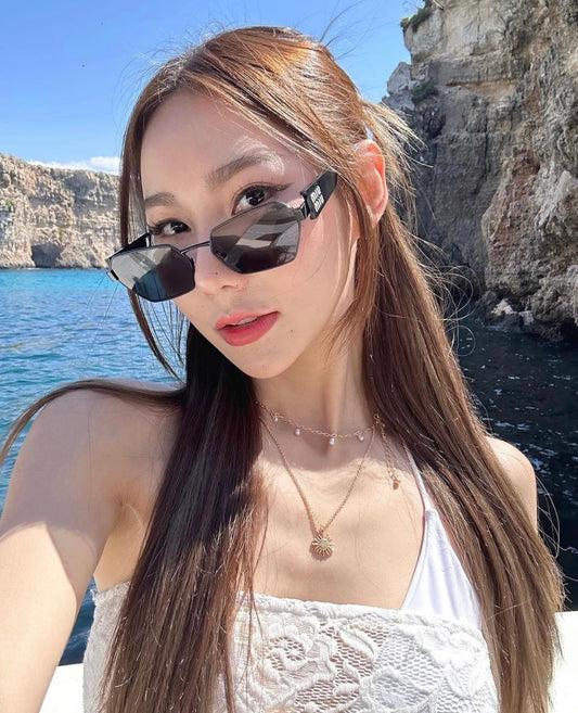 wearing MIU MIU MU 53WS ZVN5S0 RECTANGULAR SUNGLASSES