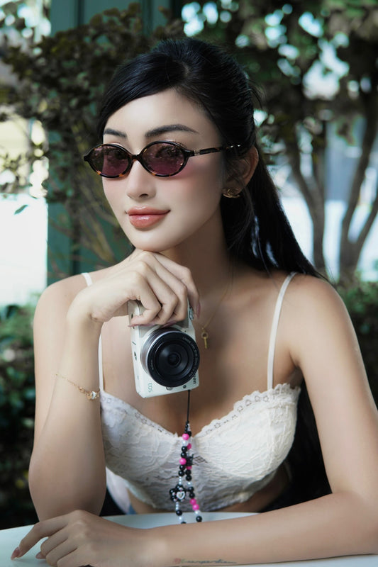wearing MIU MIU MU04ZS VAU50D REGARD SUNGLASSES AMARANTH LENSES SMU04Z_EVAU_FE50D_C_A050