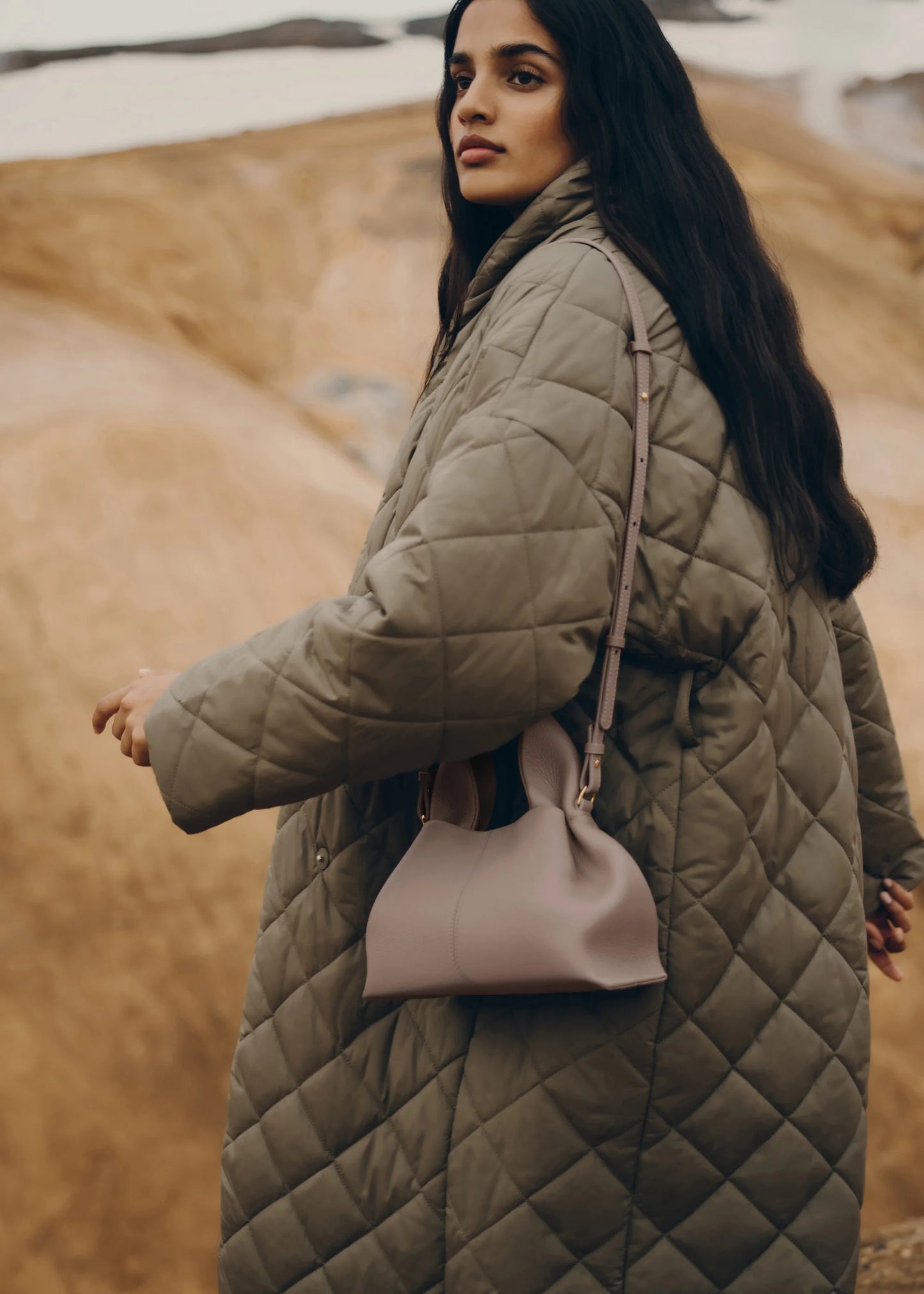 wearing NUMÉRO NEUF MINI EDITION TEXTURED TAUPE