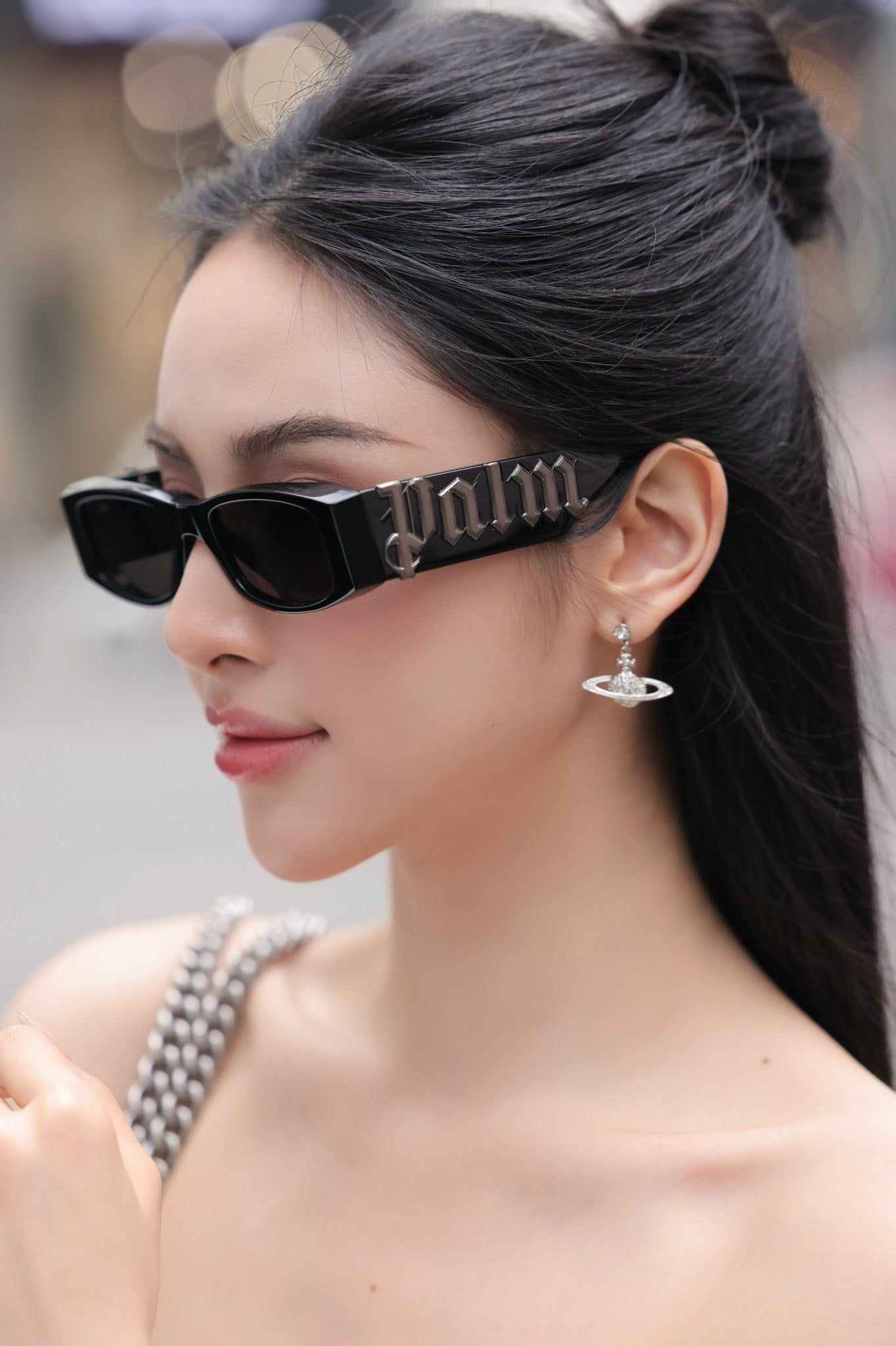 wearing PALM ANGELS ANGELS SUNGLASSES BLACK
