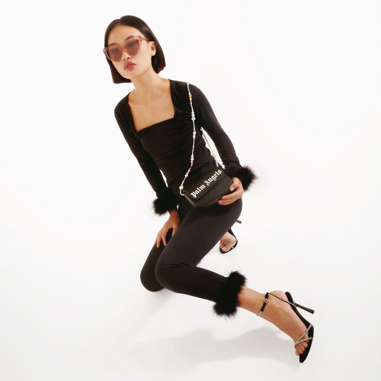 wearing PALM ANGELS MINI CRASH BAG BLACK