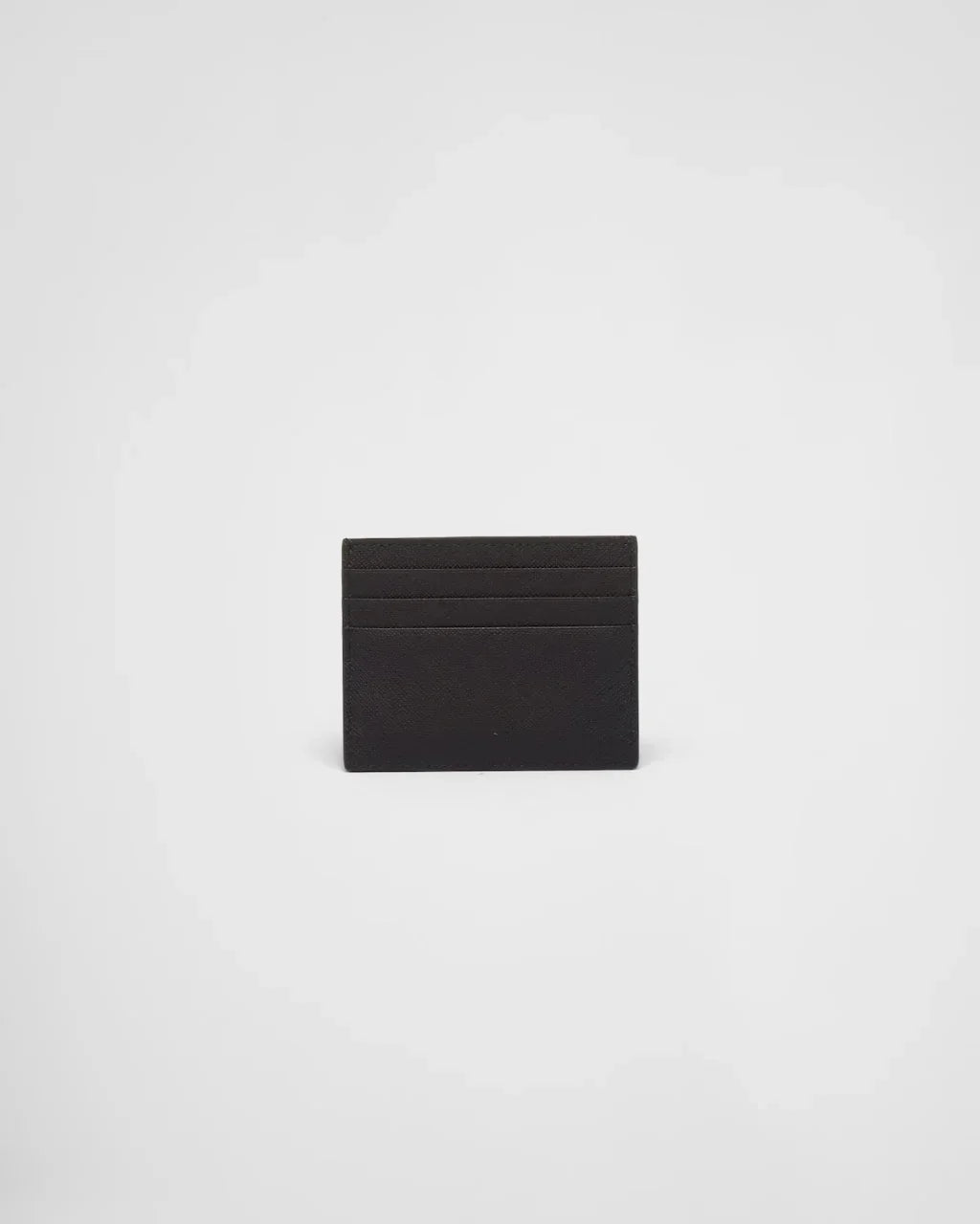 mặt sau PRADA BLACK SAFFIANO LEATHER CARD HOLDER GOLD METAL TRIANGLE LOGO 1MC025_QHH_F0002 authentic blankroom việt nam