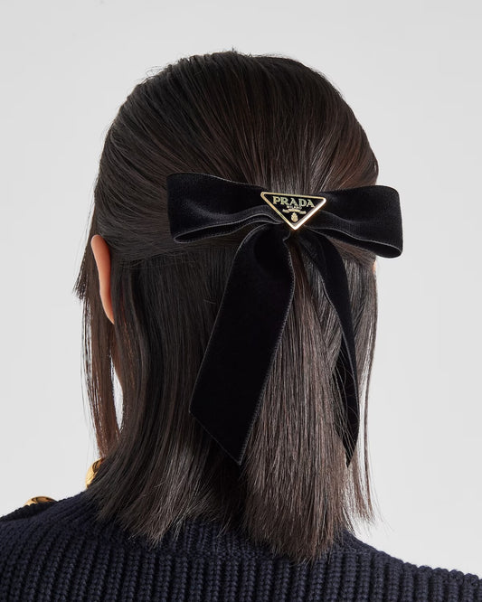 wearing Prada Black Velvet Bow Hair Clip with Enameled Triangle Logo 1IF154_068_F0002