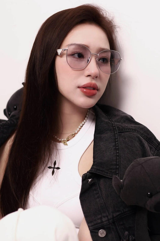 wearing Prada PR 57YS 1BC07D Sleek Silver Grey Sunglasses