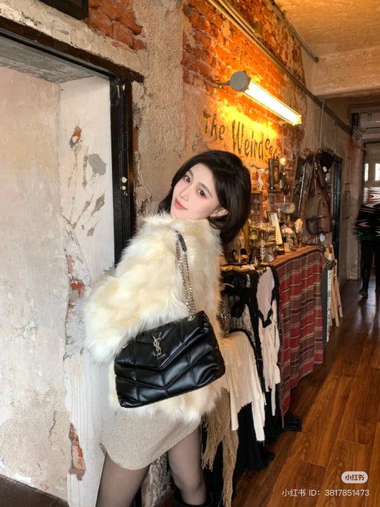 wearing SAINT LAURENT PUFFER SMALL IN NAPPA LEATHER BLACK SILVER 5774761EL001000