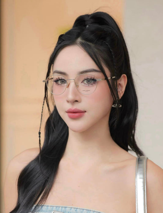 wearing SAINT LAURENT SL 532 003 GOLD EYEGLASSES