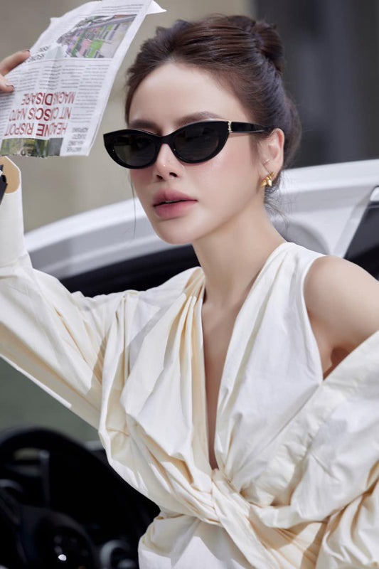wearing SAINT LAURENT SL M115 001 SUNGLASSES 736459Y99561000