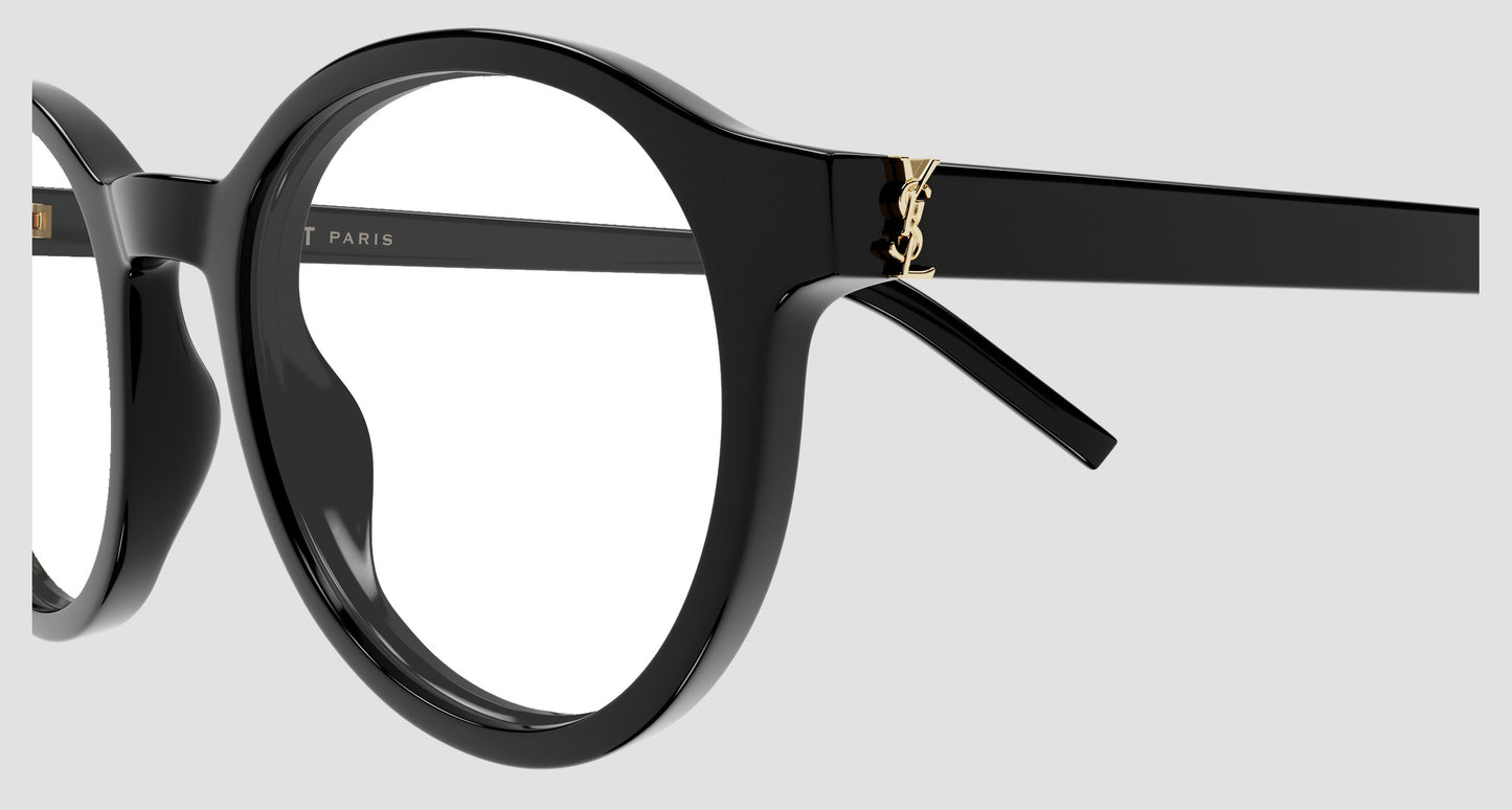 Saint Laurent SL M163 001 Black Round Eyeglasses with a gold YSL logo on the temple arm, shown against a light gray background.