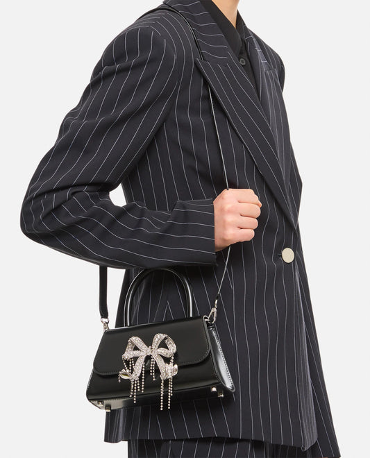 wearing Self-Portrait Black Leather Mini Bow Bag RS24-316-B