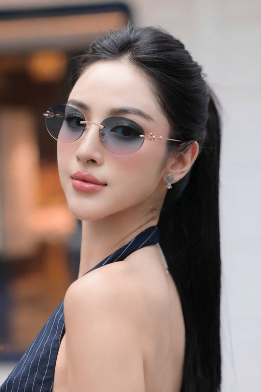 model wearing Tiffany TF3104D 621716 Rose Gold Blue Gradient Sunglasses