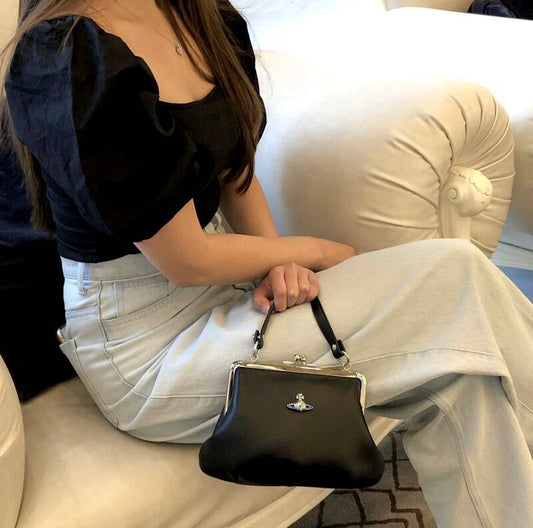 wearing Vivienne Westwood Granny Frame Purse Orb Logo 4304008BU-L001L 8050889760412