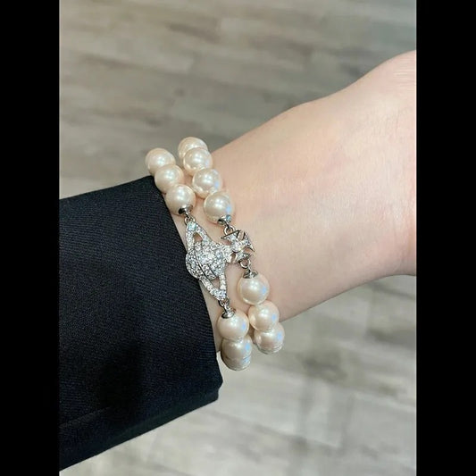 mẫu đeo VIVIENNE WESTWOOD GRAZIELLA PEARL BRACELET SILVER 6103006M-02P132-CN