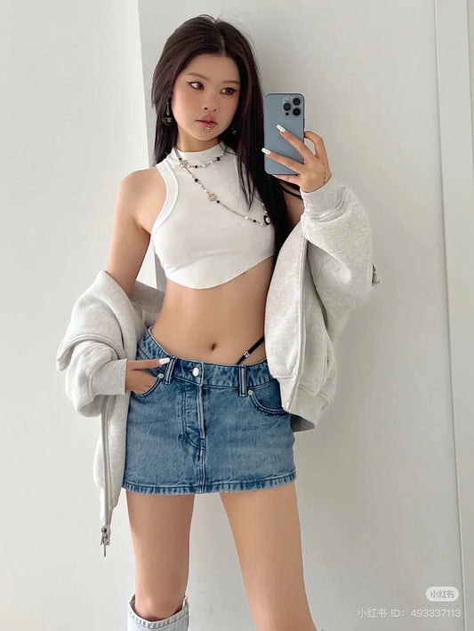 wearing ALEXANDER WANG DIAMANTE LOGO ASYMMETRICAL MINI SKIRT BLUE DENIM 4DC4225270