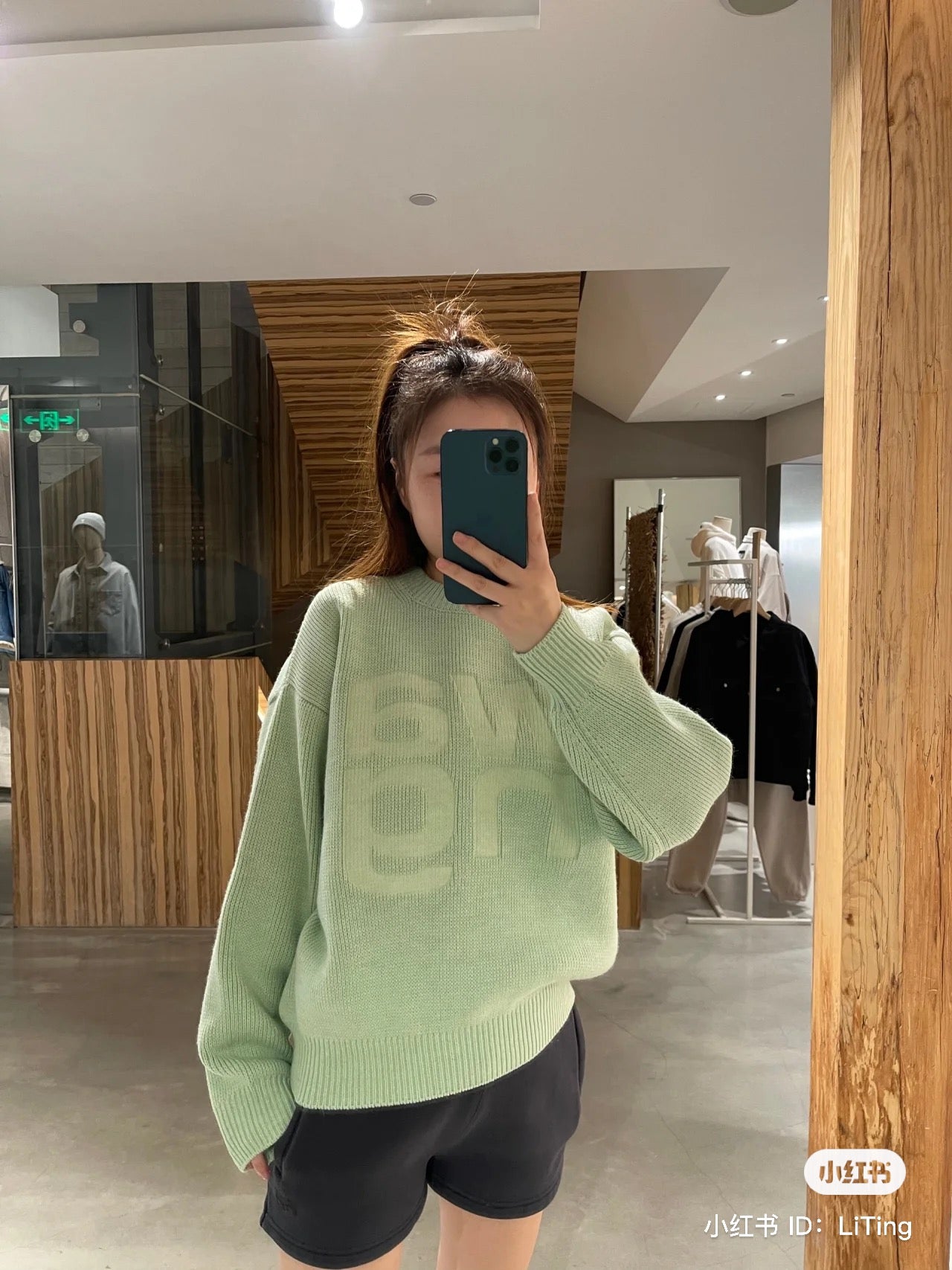 wearing ALEXANDER WANG LOGO PULLOVER IN COMPACT DEBOSS GREEN 4KC4231020 339