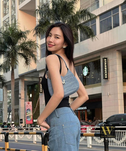 Hoa hậu Thùy Tiên mang túi Alexander Wang W Legacy Small Denim Hobo Bag 20223R02T486