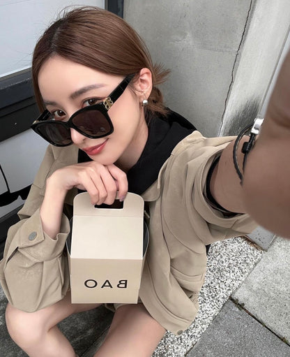 wearing BALENCIAGA BB0102SA 001 DYNASTY SQUARE SUNGLASSES BLACK