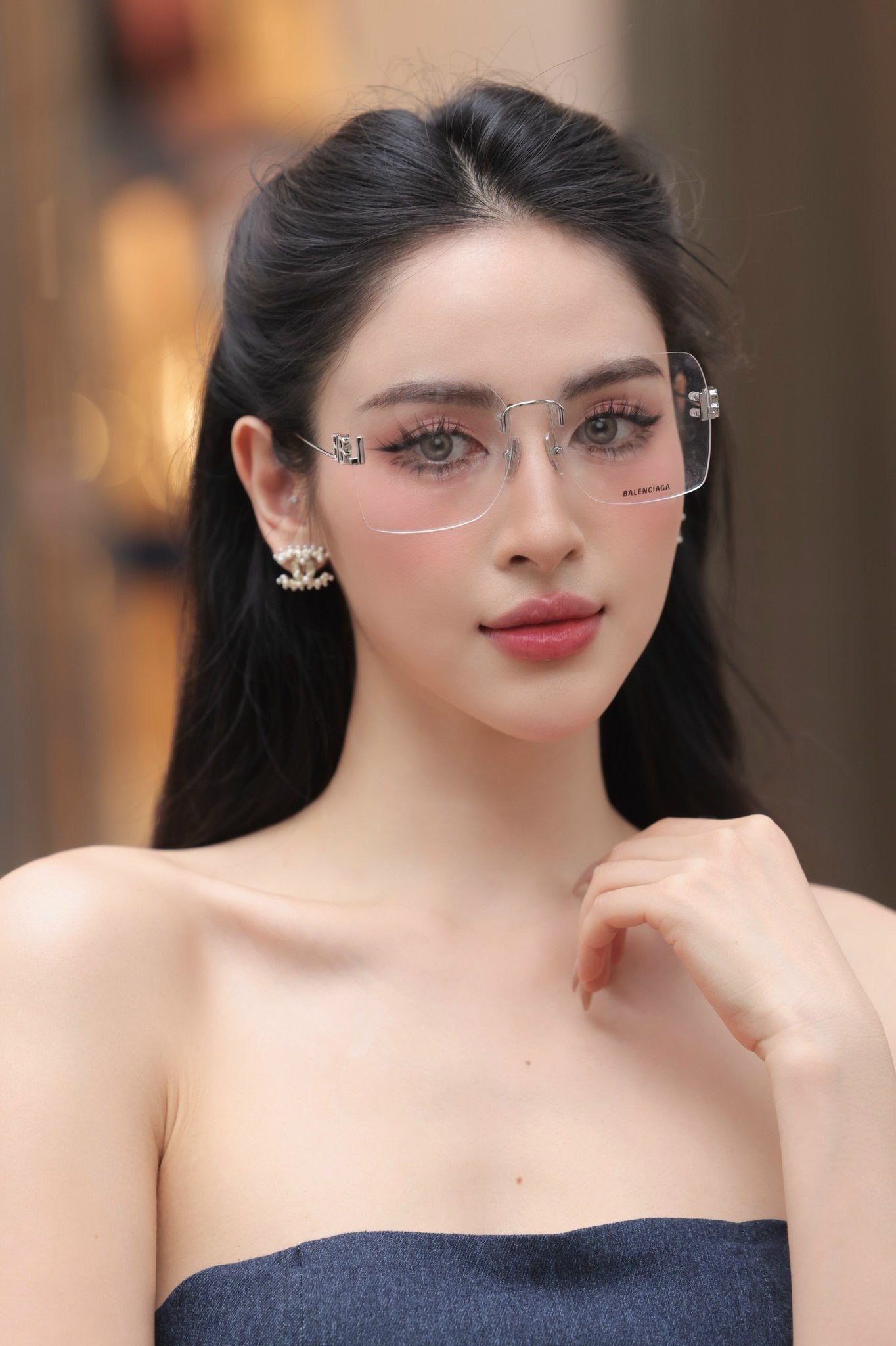 wearing BALENCIAGA BB0113O 002 EVERYDAY EYEGLASSES DOUBLE BB SILVER