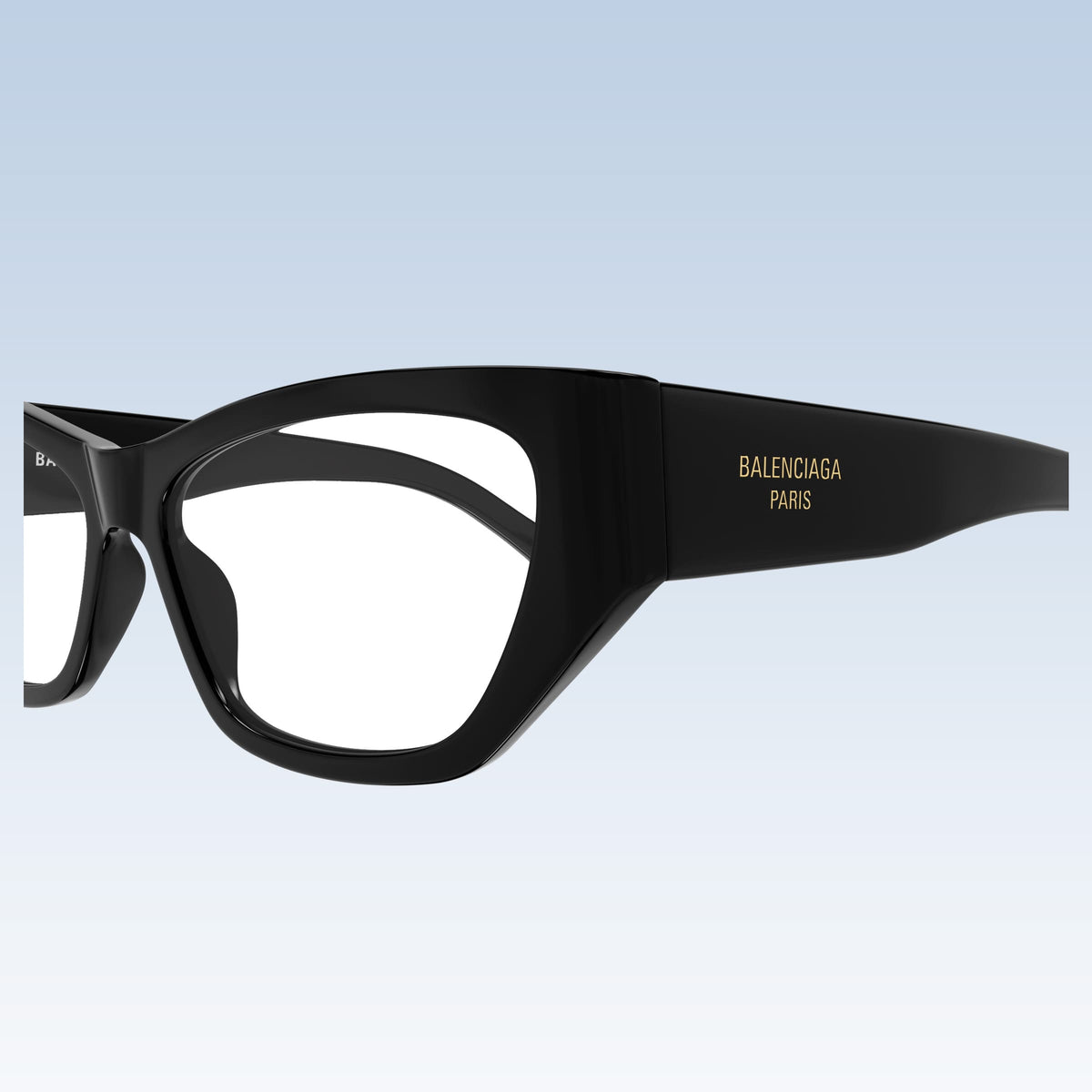 Balenciaga BB0372O 001 Black Butterfly Eyeglasses with gold lettering on the temple, shown against a light blue gradient background.