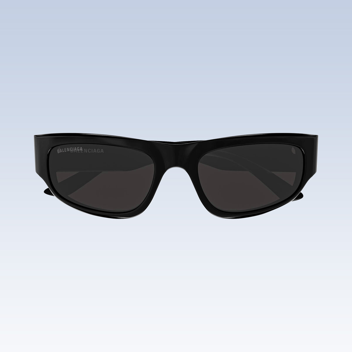 Balenciaga BB0388S 001 Black Rectangular Sunglasses with dark lenses and a subtle white logo on the left temple, shown against a light blue gradient background.