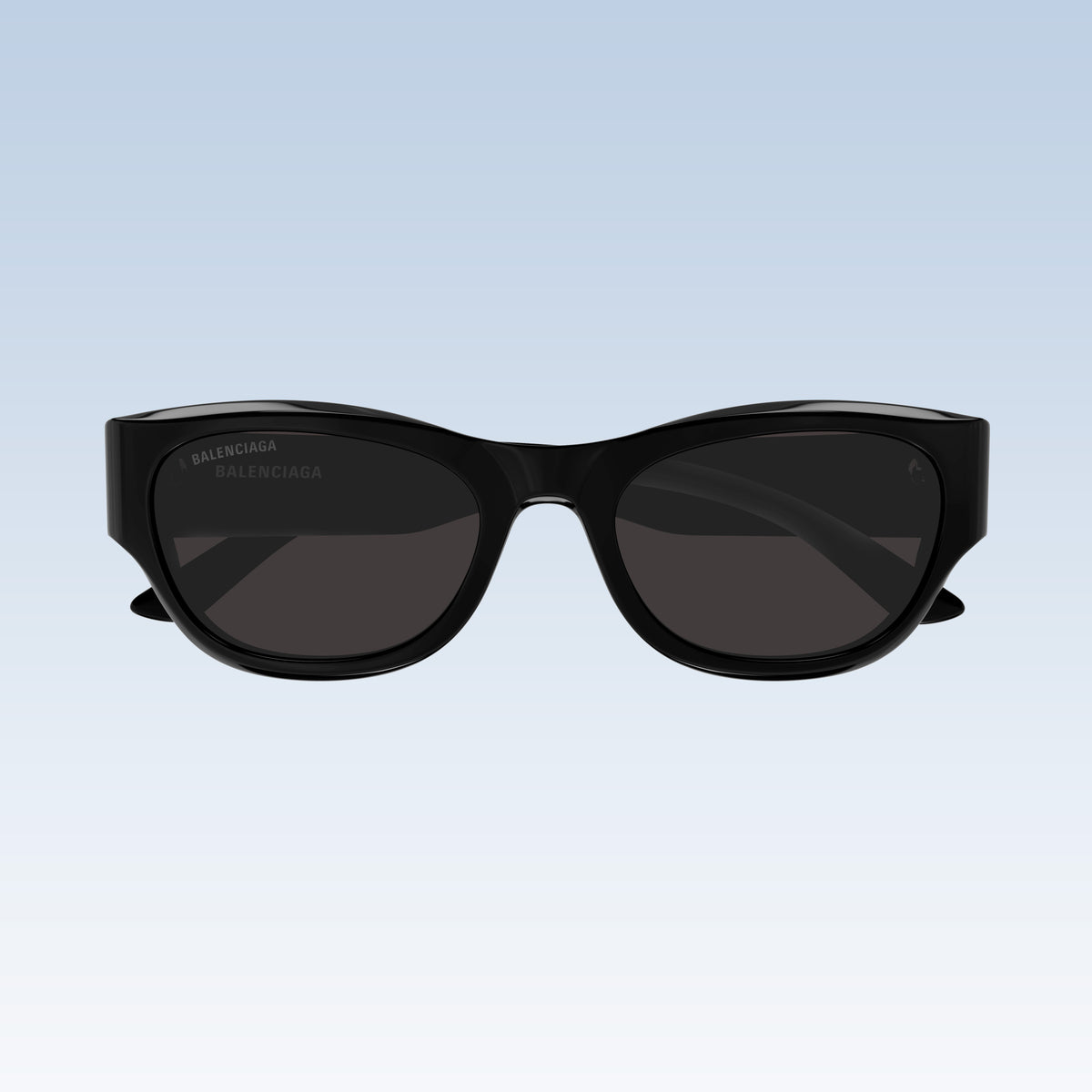 Balenciaga BB0389SK Black Rectangular Sunglasses with a glossy black frame and dark gray lenses, shown against a light blue gradient background.