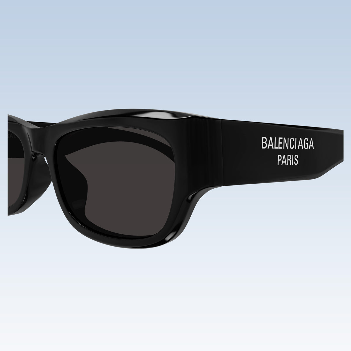 Balenciaga BB0390SK 001 Black Square Sunglasses with dark lenses and white logo text on the temple arm, shown against a plain white background.