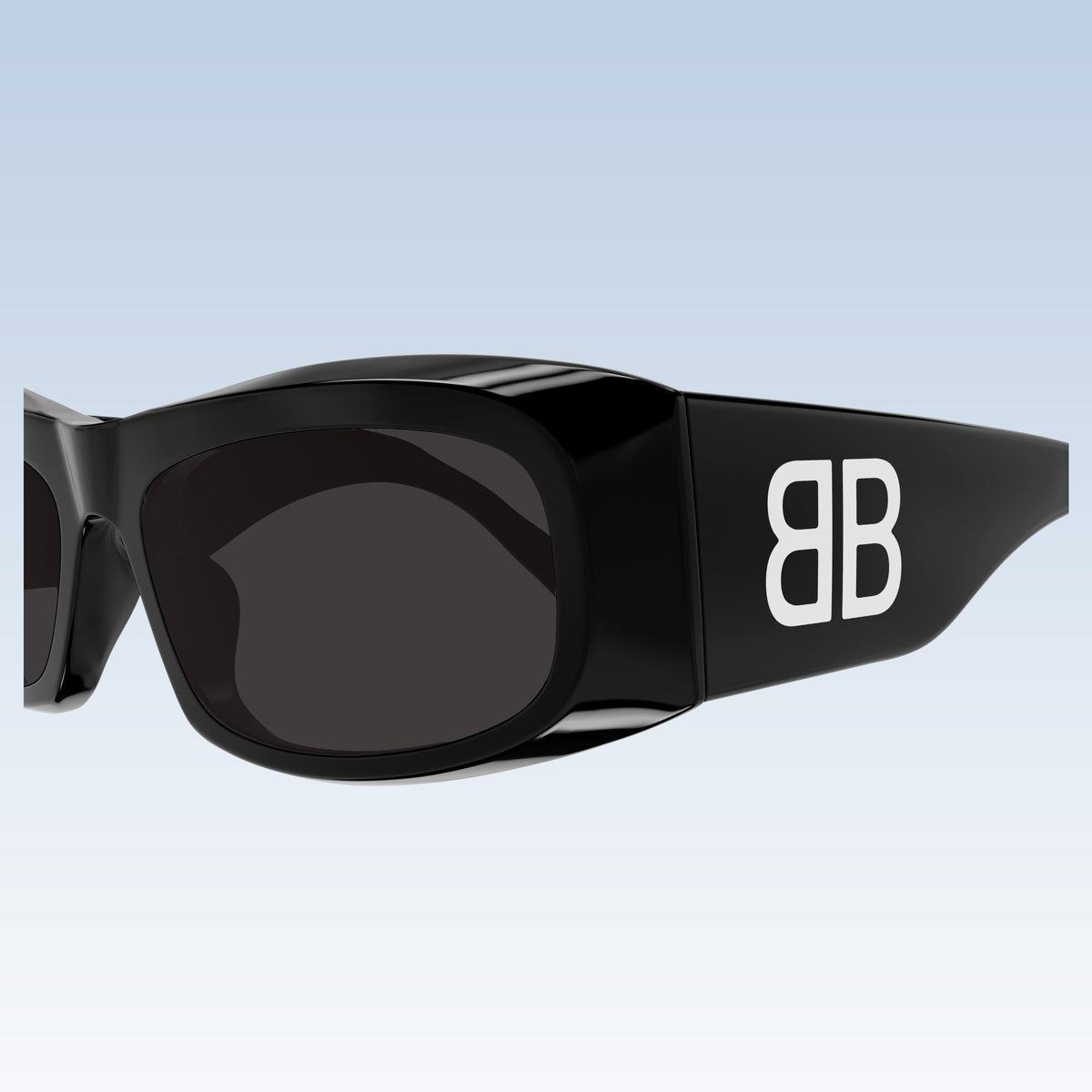 Balenciaga BB0395S 001 Black Rectangular Sunglasses with dark lenses and a bold white 'BB' logo on the temple, shown against a light blue gradient background.