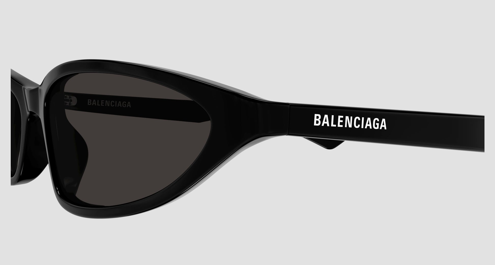 Balenciaga BB0402S-001 Black Cat-Eye Sunglasses with a white background