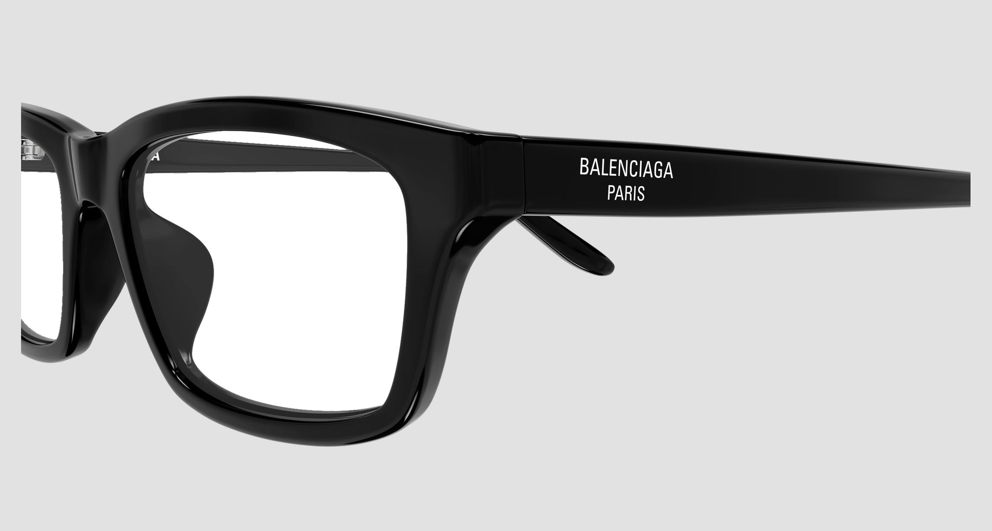 Balenciaga Paris BB0439O 001 Black Square Eyeglasses frames shown in a close-up side profile against a light gray background.