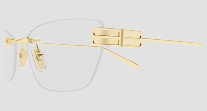 Balenciaga BB0490O-004 Gold Rimless Cat-Eye Eyeglasses with a unique hinge design and clear lenses, shown against a light gray background.
