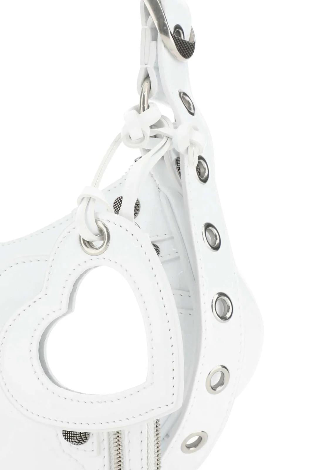 BALENCIAGA LE CAGOLE XS SHOULDER BAG IN PATENT WHITE