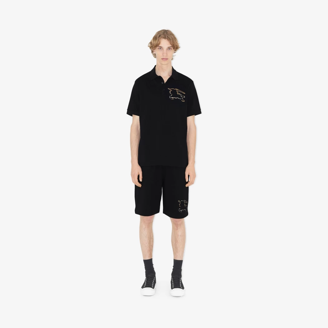 wearing Burberry Check EKD Cotton Polo Shirt In Black 80706821 