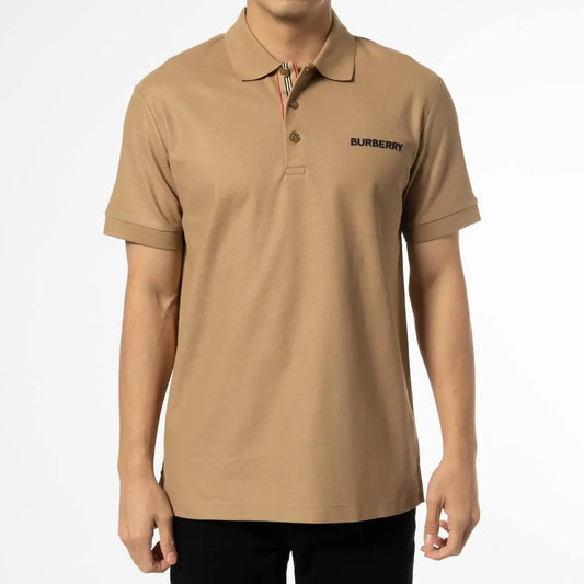 Burberry Hartford Polo In Camel 8084438 worn by a person on a white background