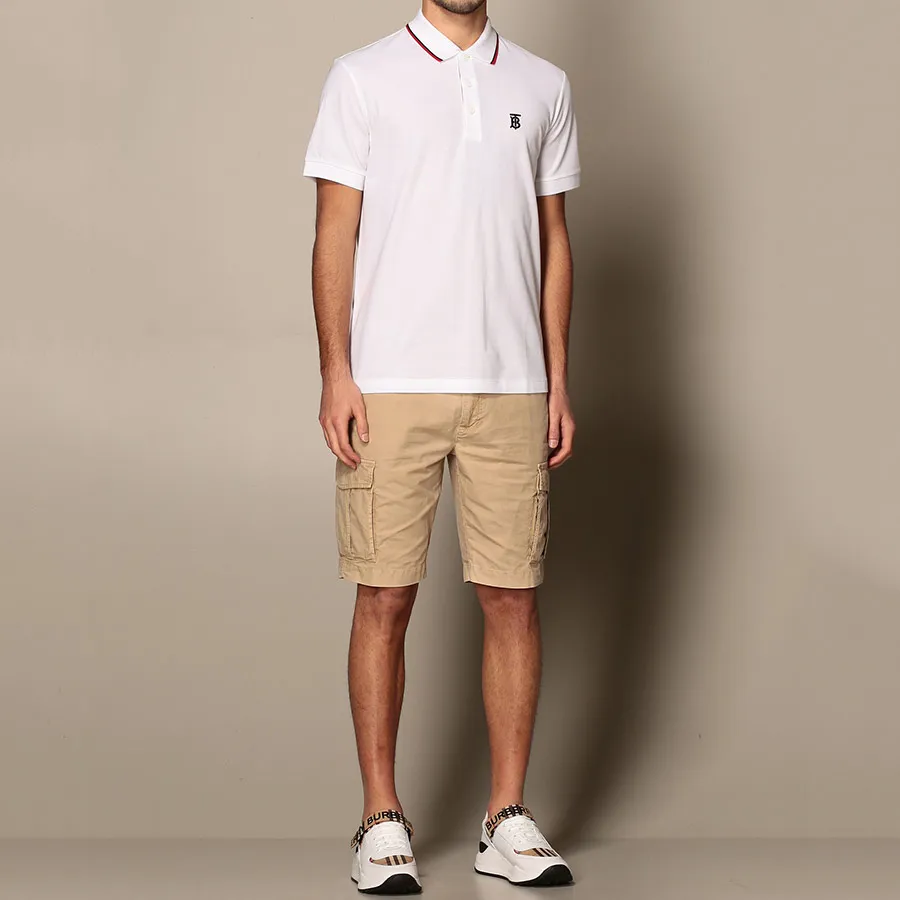 wearing BURBERRY ICON STRIPE PLACKET COTTON PIQUÉ POLO SHIRT IN WHITE 8017004 