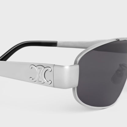 Celine Triomphe Metal 03 Sunglasses in Metal – CL40281U 16A with a logo on the frame against a light gray background