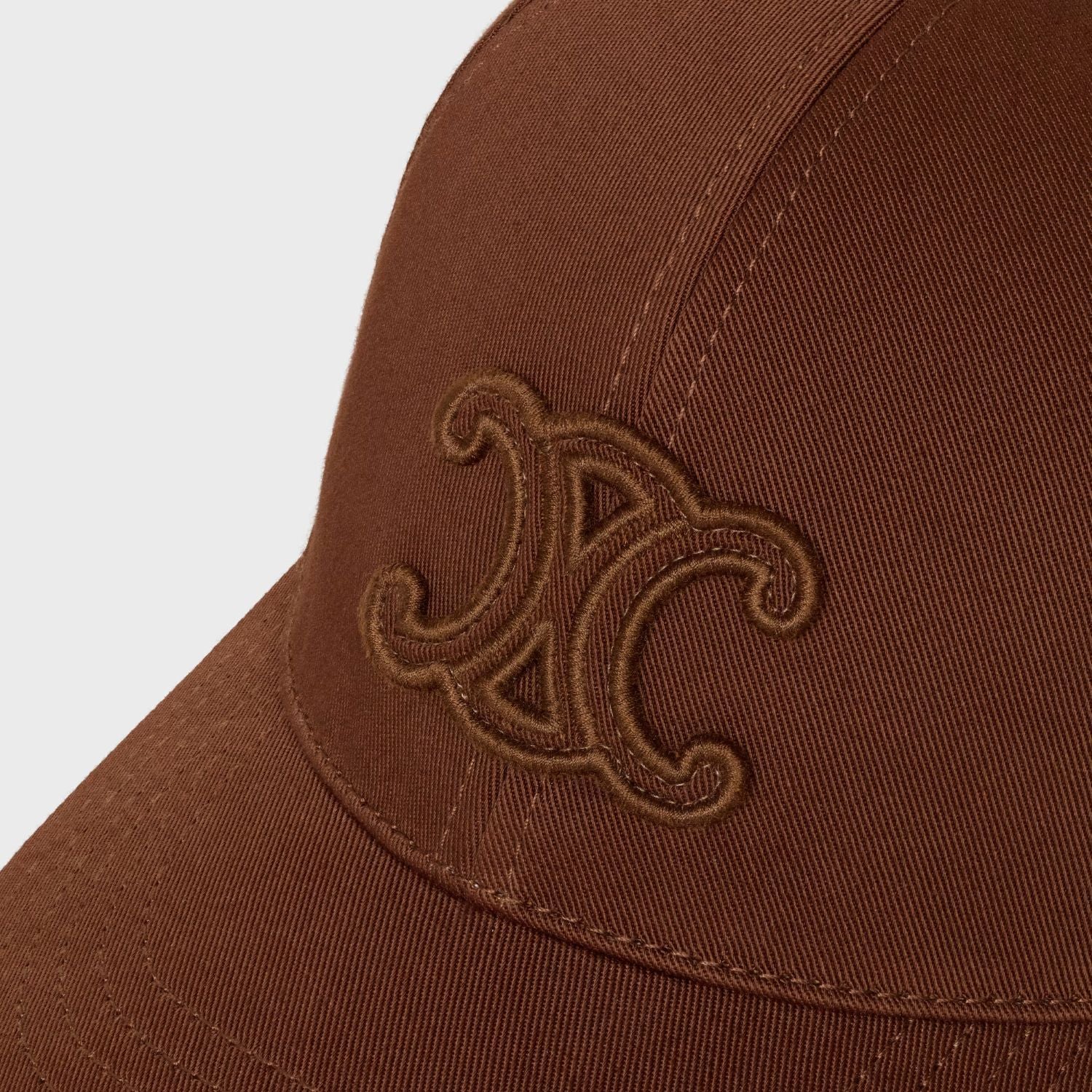 Celine Triomphe Baseball Cap in Cotton Gabardine Tiramisu 2AUG4234X.GAA7 with a logo on a light gray background